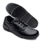 black Super Drills marching band shoes, pair with front three-quarters and sole.