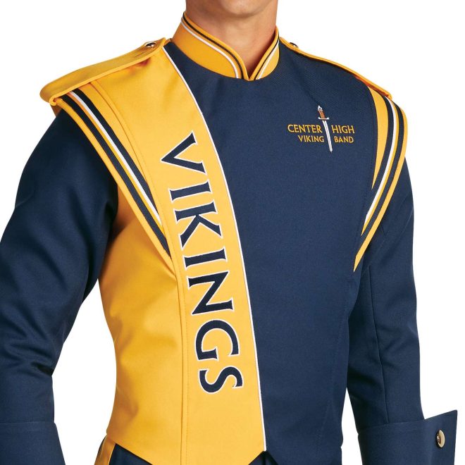 Custom navy with yellow and white detailing marching band uniform. Front view with matching navy shako, white gloves, and navy pants and gauntlets