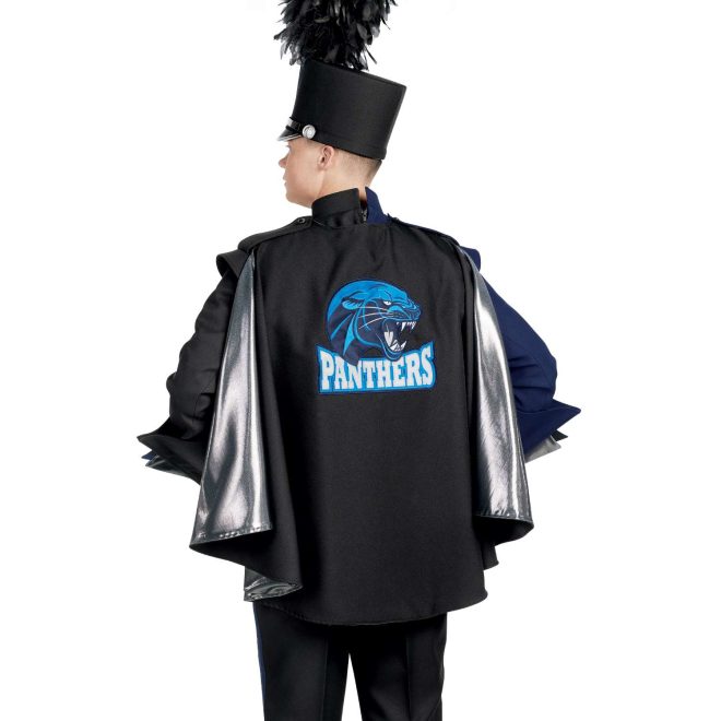 Custom navy and black marching band uniform. Back view with black shako, one black gauntlet, one navy gauntlet, and black gloves and pants with black cape with blue mascot and logo with silver underside