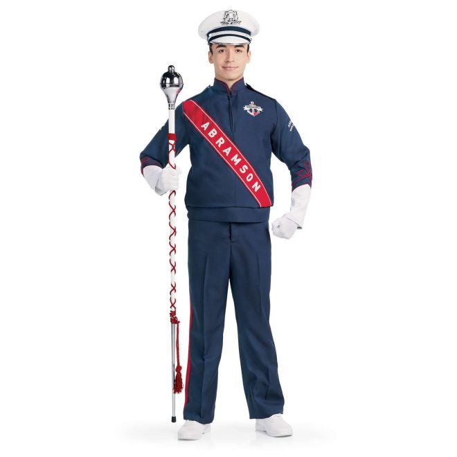 Custom navy with white and red detailing marching band uniform long sleeve. Front view with matching baylay parade cap, white shoes, white gloves, and navy pants holding amazing mace