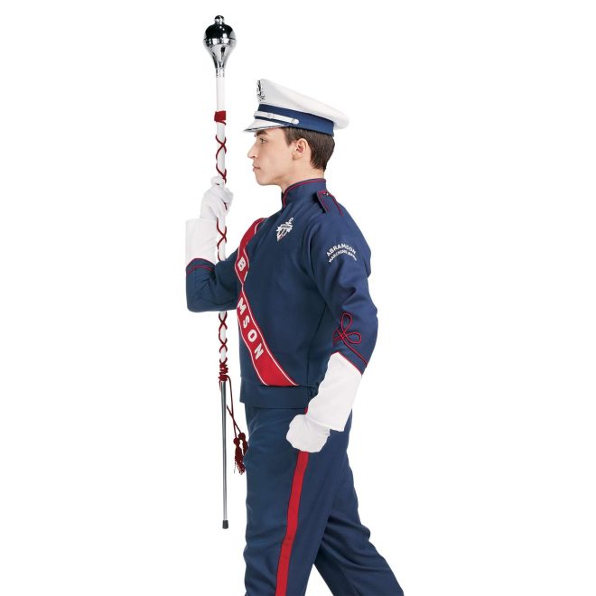 Custom navy with white and red detailing marching band uniform long sleeve. Side view with matching baylay parade cap, white gloves, and navy pants holding amazing mace