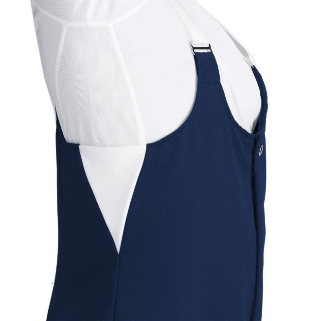 navy custom classic marching band bibber side view with white straps. Shown with white long sleeve undershirt