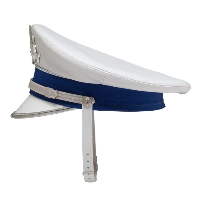 side view of white and royal custom bayly parade cap with silver accessories and white strap