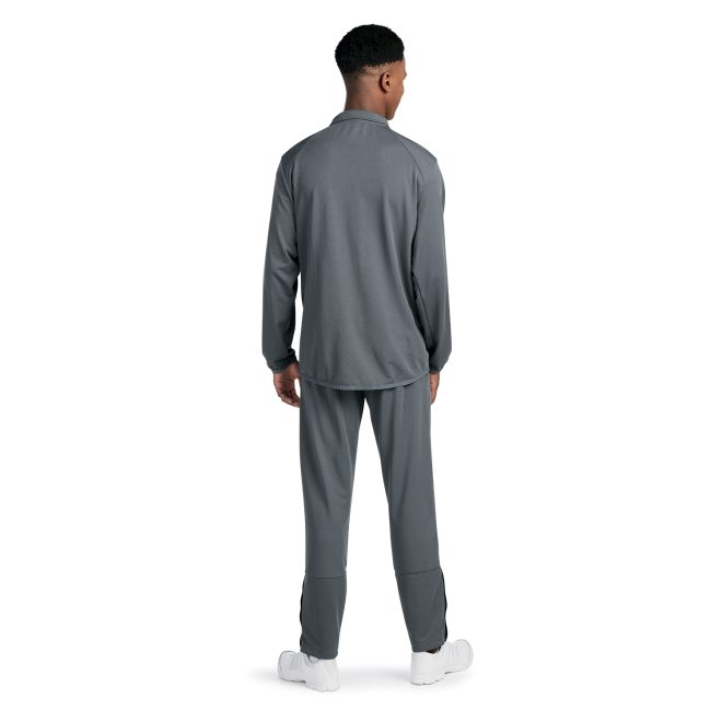 grey badger outer core warm up pant back view paired with grey jacket