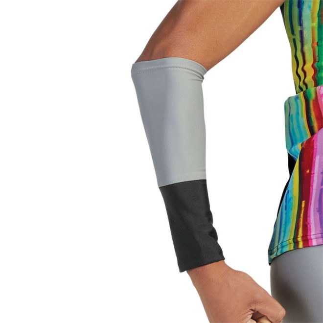 custom one short sleeve and one sleeveless black and grey color guard tunic with rainbow print on body with matching one leg black one grey pants and matching black and grey arm cuff front view on model