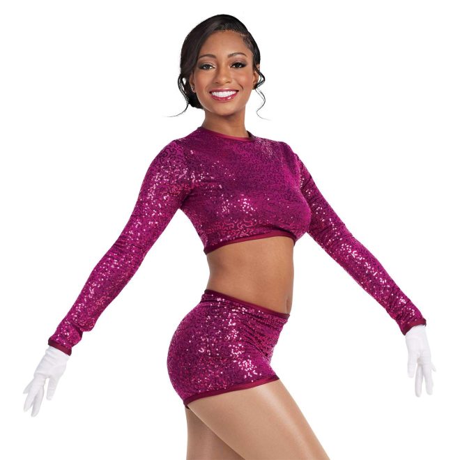 custom maroon micro sequin long sleeve crop top with matching maroon micro sequin shorts majorette uniform front view on model wearing white gloves