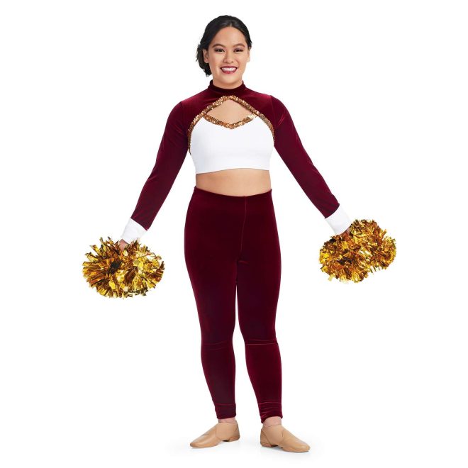 custom maroon long sleeve with white chest and cuffs and keyhole bodice with gold sequin trim crop top with matching maroon pants majorette uniform front view on model holding gold poms