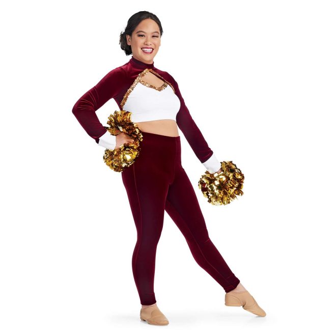 custom maroon long sleeve with white chest and cuffs and keyhole bodice with gold sequin trim crop top with matching maroon pants majorette uniform front view on model holding gold poms