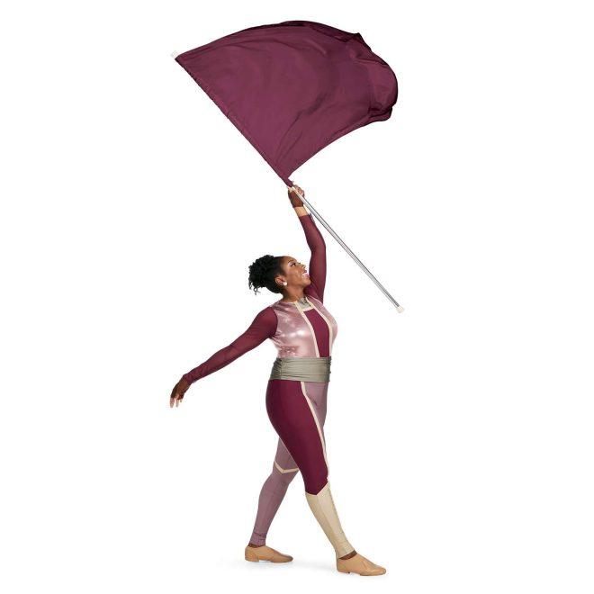 Custom long sleeve legging color guard unitard. Maroon sleeves, center of chest, and side of right leg. Metallic pink on both sides of chest and inside of right leg and complete left leg. Cream trim separating colors and below knee on right leg. Silver neck and belt. Side view on model holding maroon flag