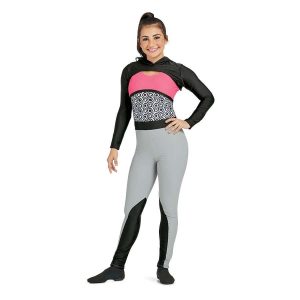 Custom sleeveless legging color guard unitard. Pink chest, black and white circular pattern body, grey pants all separated by black stripes. Pants have black section from knee down. Front view on model with black long sleeves and hood