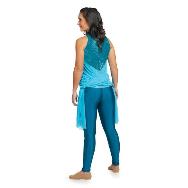 Custom sleeveless legging color guard unitard. Top sparkly turquoise into solid turquoise leggings. Each side has mesh turquoise drapes crisscrossed and tied together. Back view on model