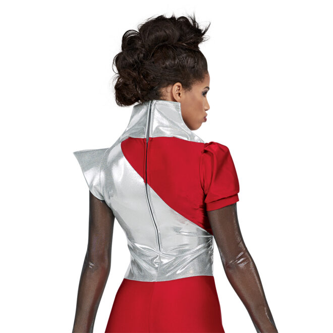 Custom long sleeve color guard unitard. Black/silver long sleeve left sleeve silver cape shoulder and collar, right sleeve red puff short sleeve. Body is silver from left shoulder to under right arm where it is red. Pants are red. Back view on model.