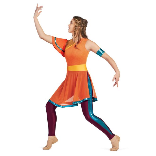 Custom legging color guard unitard. Left sleeveless orange shoulder continuing diagonally to under right arm. Right arm orange with turquoise stripe sleeve and rest of shoulder dark gold. Yellow belt with orange mesh skirt with turquoise trim. Maroon leggings with turquoise stripe underneath. Front view on model with turquoise cuff on left arm