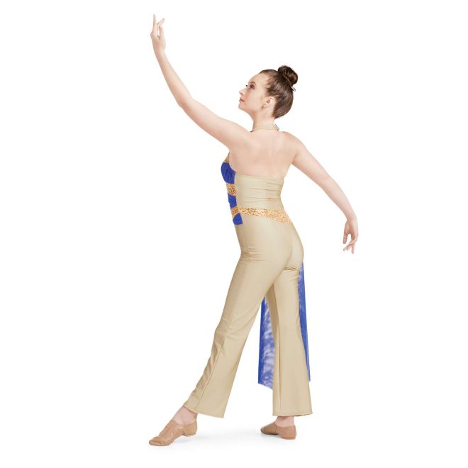 Custom halter top pant color guard unitard. Tan base with gold sequin section around waist and blue mesh ruffle off right hip to floor. Back view on model