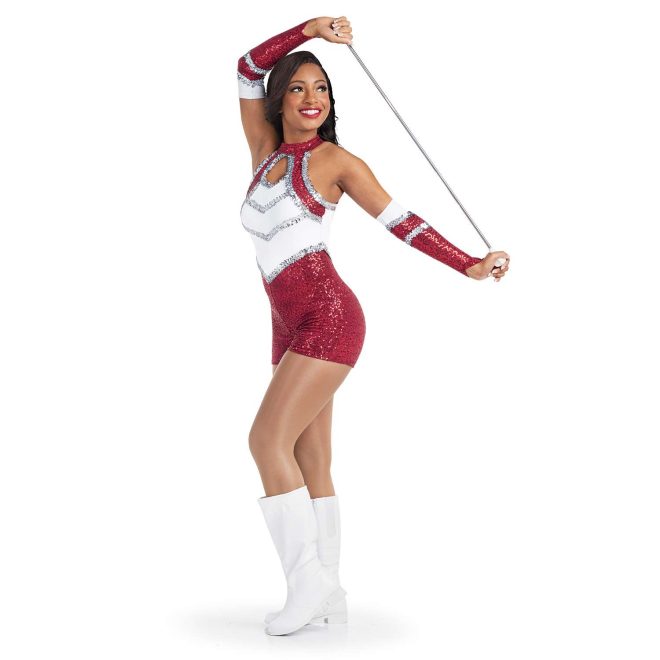 custom a-line sleeveless Red Micro Sequin, White Matte Spandex, Silver Sequin Trim with keyhole bodice, shorts majorette unitard uniform front view on model wearing matching Gauntlets in Red Micro Sequin, White Matte Spandex, Silver Sequin Trim holding baton wearing white boots