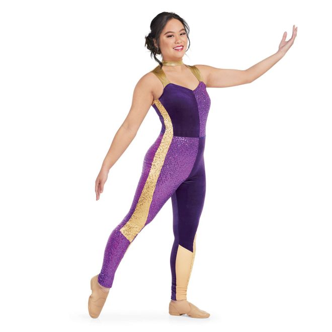 Custom sleeveless legging color guard unitard. Gold straps and neck with cutout upper chest, right chest and left leg velvet purple. Left chest and right leg purple sequin. Right side has gold sequin stripe from under arm to knee and solid gold inside leg from knee down. Left side has gold stripe from under arm to knee and sequin gold from knee down and solid gold on inside leg from knee down. Front view on model