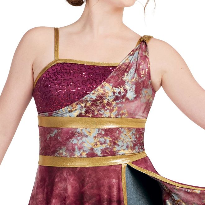 Custom sleeveless color guard dress with built in boy shorts. Dress white and maroon marble. Left strap marble sash down to middle right chest. Right strap gold with maroon sequin chest section under. Two small stripes of gold around waist and gold trim on chest and down skirt slit. Front view on model showing built in grey shorts