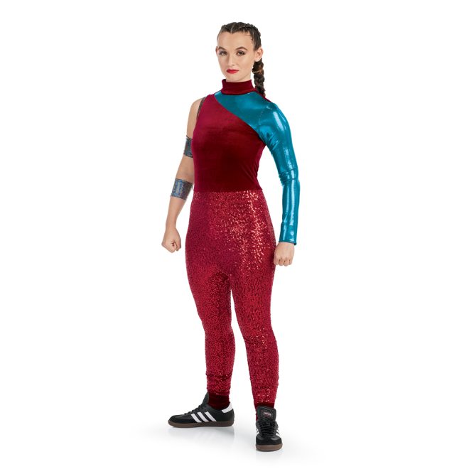 Custom percussion uniform. Red top with one sleeveless arm and one metallic teal sleeve. Sequin red pants front view with two arm cuffs