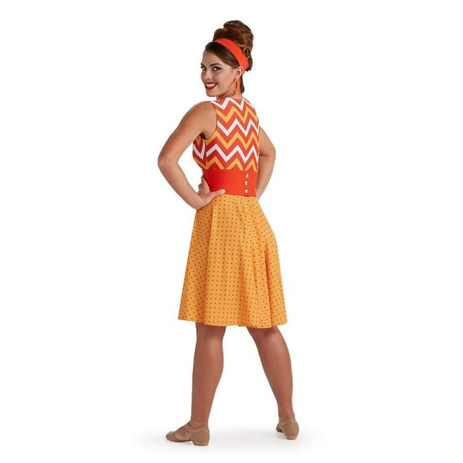 custom sleeveless oranges color guard knee length dress with chevron top solid orange belt and polka dot skirt back view on model with orange headband and earrings