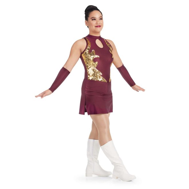 custom maroon sleeveless a-line with keyhole bodice and gold sequin detailing twirler dress with side slits and attached briefs front view on model wearing maroon arm mitts and white boots