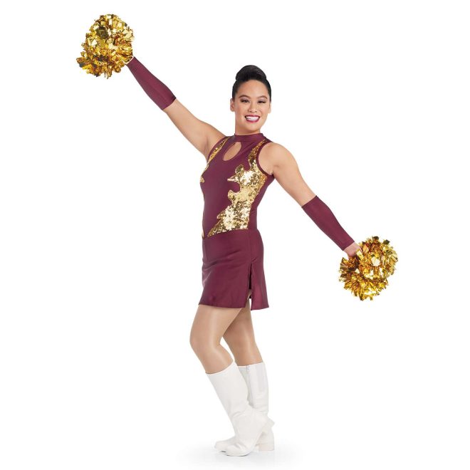 custom maroon sleeveless a-line with keyhole bodice and gold sequin detailing twirler dress with side slits and attached briefs front view on model wearing maroon arm mitts and white boots holding gold poms