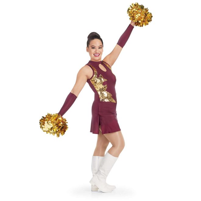 custom maroon sleeveless a-line with keyhole bodice and gold sequin detailing twirler dress with side slits and attached briefs front view on model wearing maroon arm mitts and white boots holding gold poms