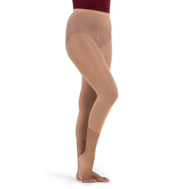 Model wearing Suntan Capezio Ultra Hold Footless Tight, Front Three-quarters View