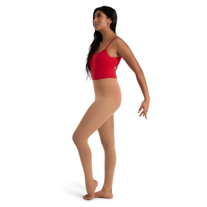 Model in a red bodysuit wearing Caramel Capezio Ultra Soft Stirrup Tights, side view