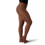 Model wearing Mocha color Capezio Ultra Soft Transition Tights, front three-quarters view
