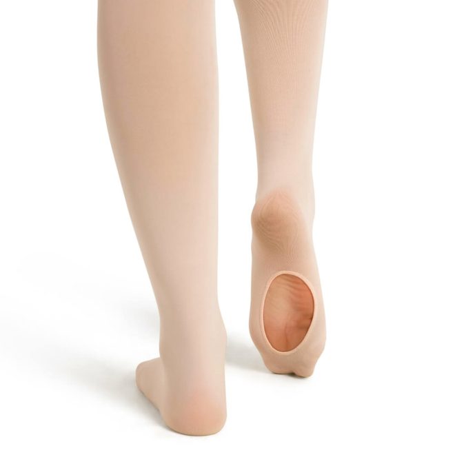 Model wearing a tan capezio body tight, transition foot detail