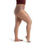 Model wearing suntan Capezio Ultra Shimmer Footed Tights, side view