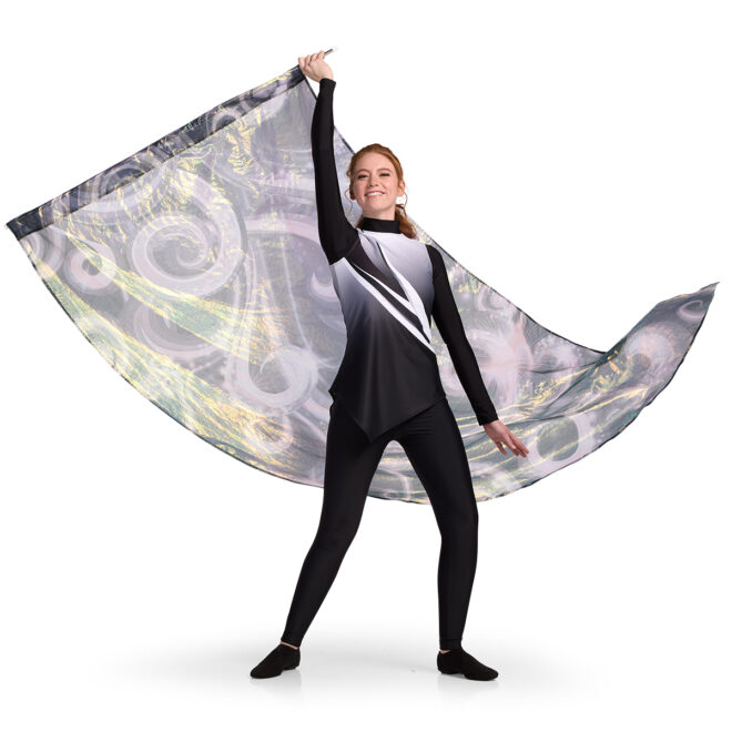 model swinging a flag wearing a white to black gradient asymmetric color guard tunic over black leggings and black long sleeve crop top, front view