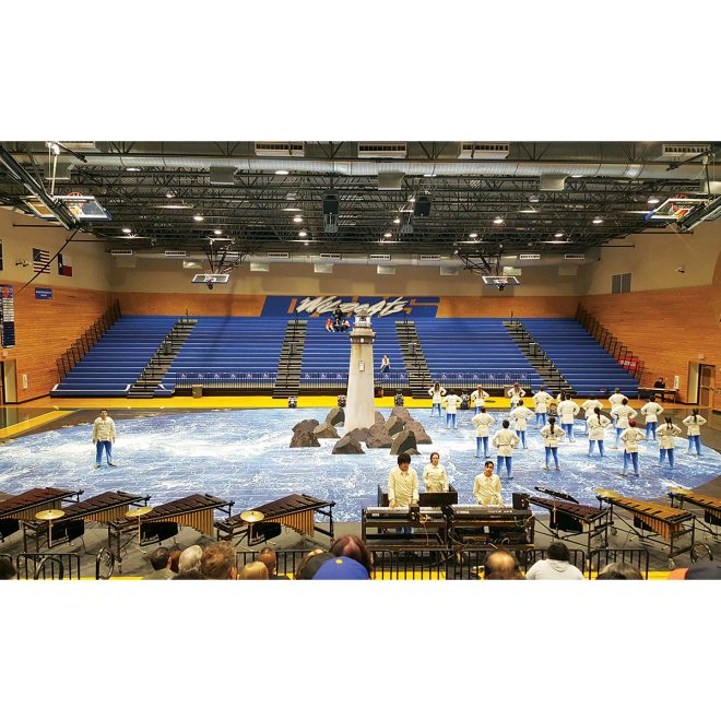 blue water and white waves digitally printed field and floor tarp used during performance in gym