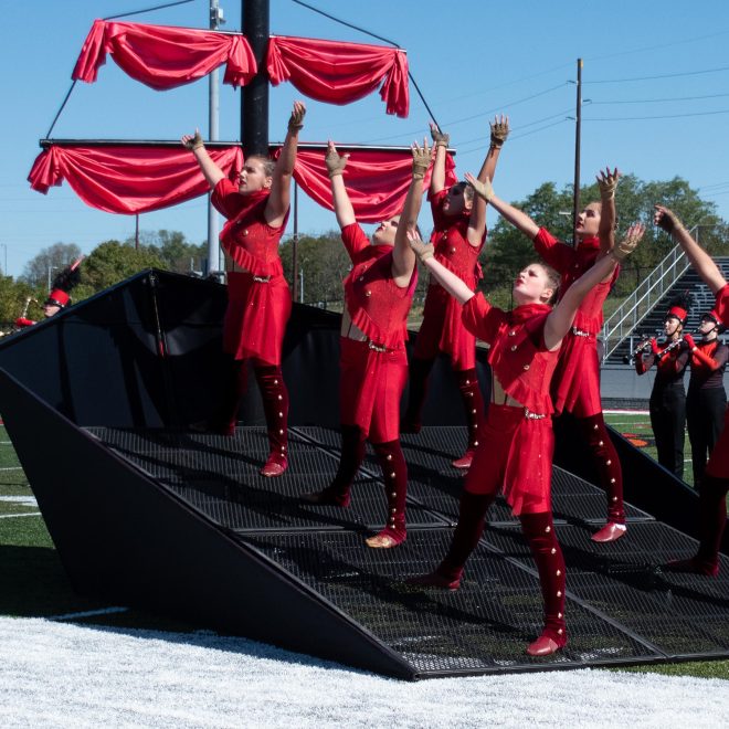 corps design portable ramp with accessories around to look like pirate ship being used on football field