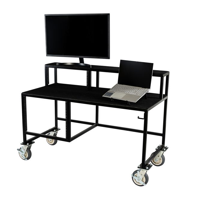 corps design lighting desk holding laptop and monitor