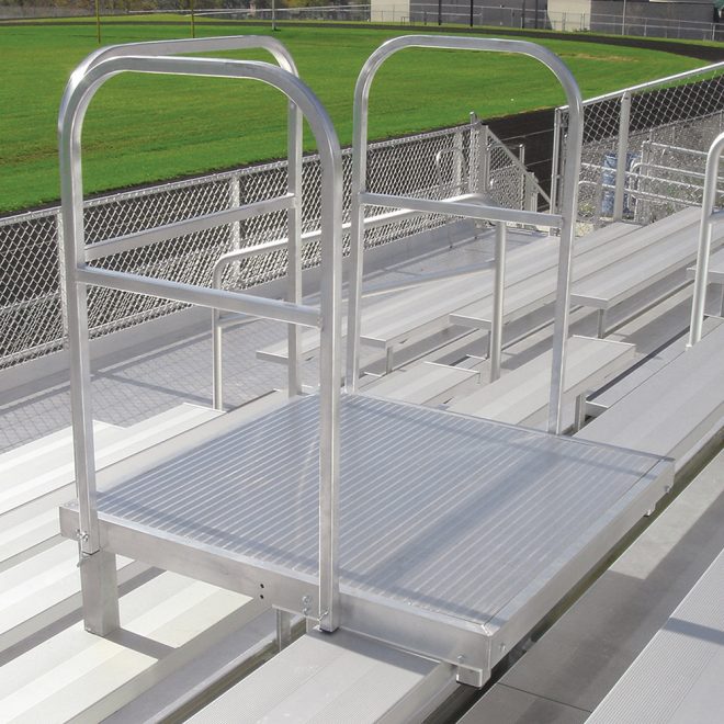 silver DSI moveable bleacher podium attached to bleachers outside