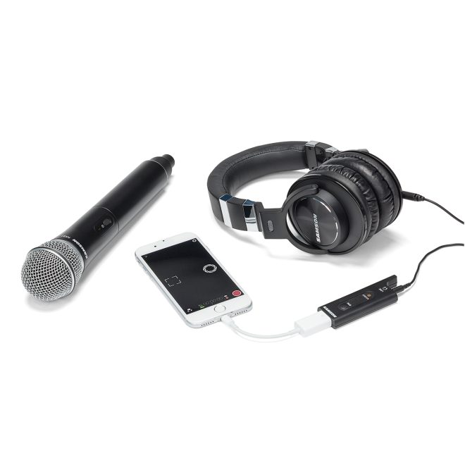 samson xpd2 digital wireless handheld mic with headphones connected to phone