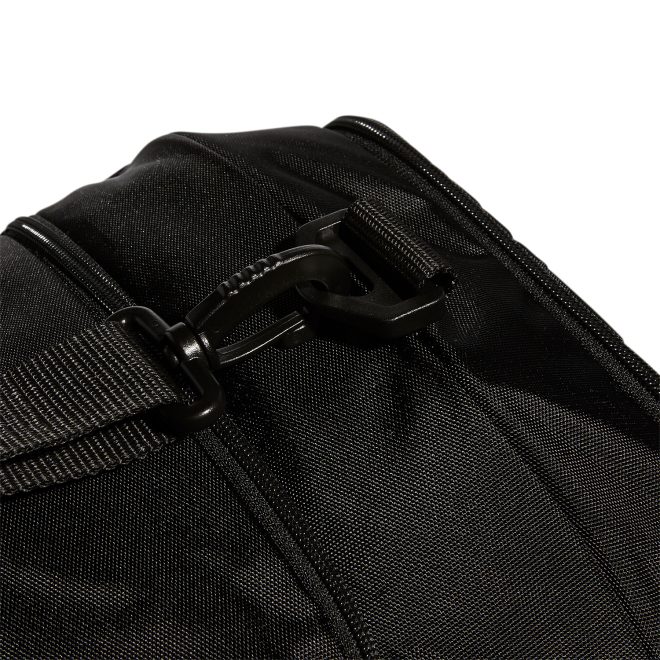 black and silver adidas medium defender iv duffel close up top strap attachment