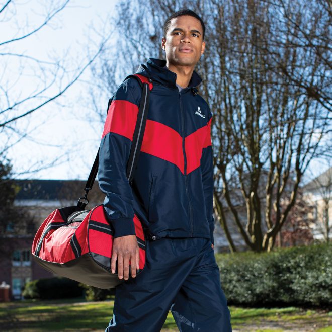 red and black holloway rivalry duffel bag worn on shoulder front view