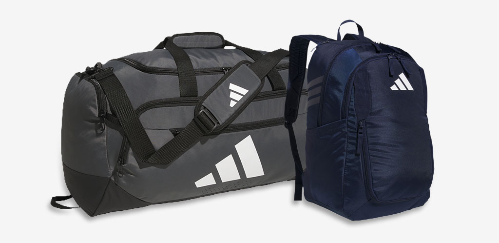 grey adidas duffel bag with a navy adidas backpack