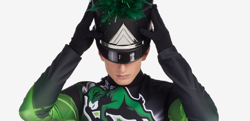 marching band member holding his hat with black cotton gloves
