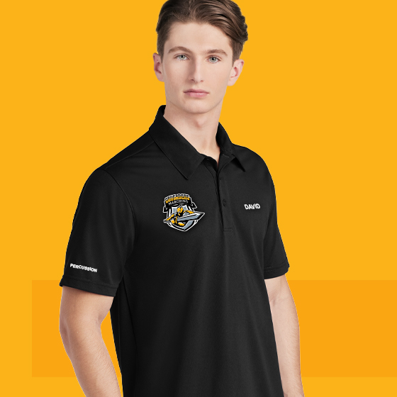 Pep band member in a black embroidered polo shirt.
