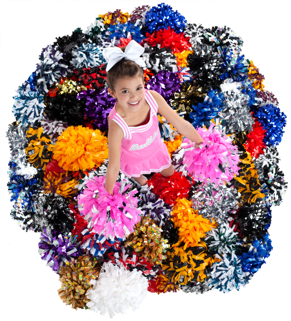 young cheerleader in a pink uniform standing in a pile of colorful poms
